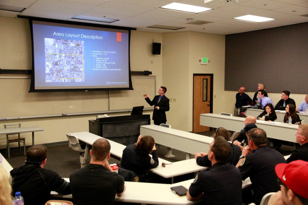 Reno Police Department members watch a presentation